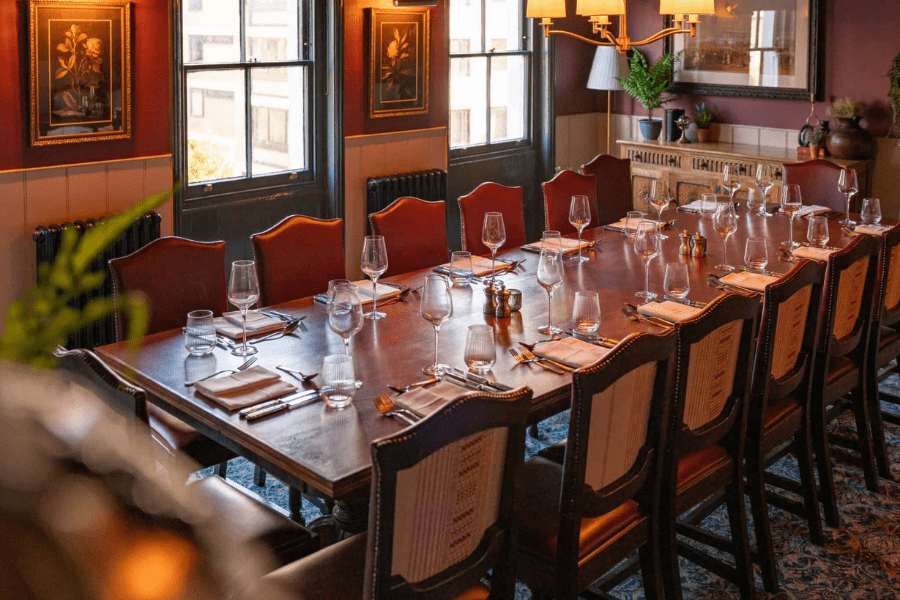 A set table in the private dining area of the Punch Bowl Pub