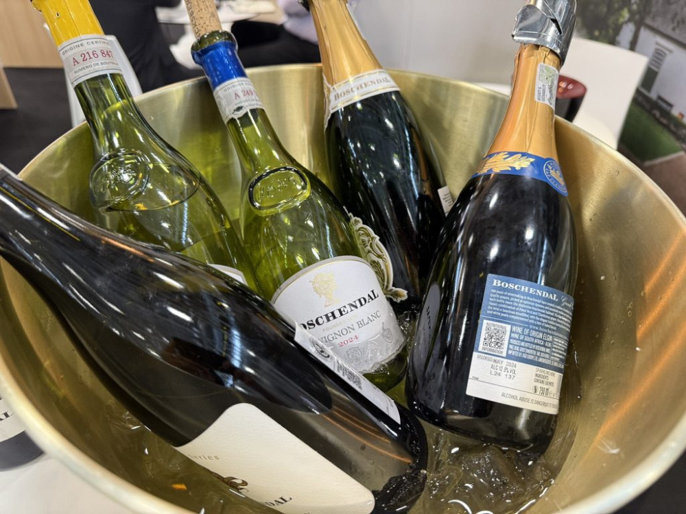 Five white and sparkling wines in an ice bucket at a one day wine course london