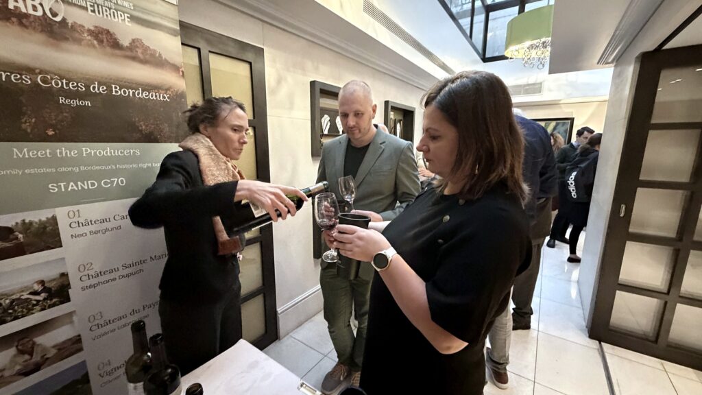 Premières Côtes de Bordeaux producers pouring wines for UK trade guests